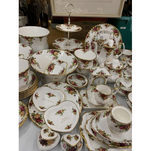 15 - A VERY LARGE COLLECTION OF ROYAL ALBERT OLD COUNTRY ROSES TO INCLUDE TRIOS, JUGS, SUGAR BOWLS, COFFE... 