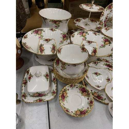 15 - A VERY LARGE COLLECTION OF ROYAL ALBERT OLD COUNTRY ROSES TO INCLUDE TRIOS, JUGS, SUGAR BOWLS, COFFE... 