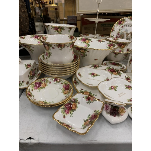 15 - A VERY LARGE COLLECTION OF ROYAL ALBERT OLD COUNTRY ROSES TO INCLUDE TRIOS, JUGS, SUGAR BOWLS, COFFE... 