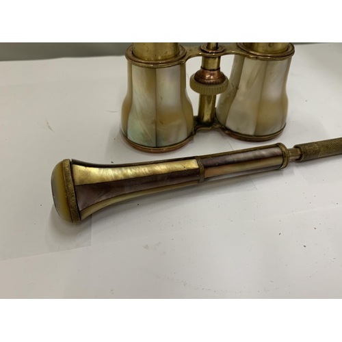 27 - AN ANTIQUE PAIR OF MOTHER OF PEARL OPERA GLASSES WITH A MATCHING HANDLE