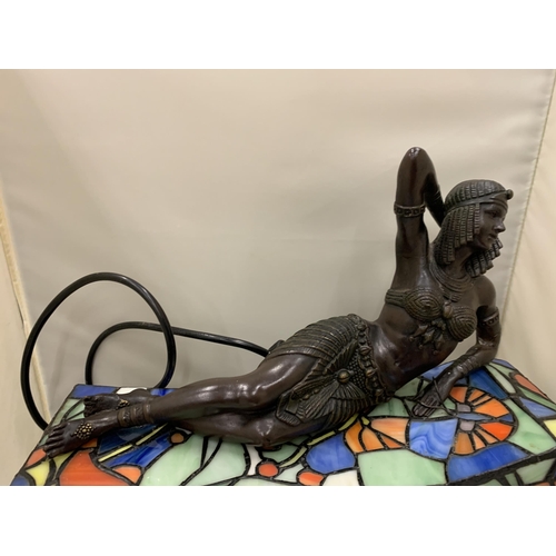 35 - AN ART NOVEAU STYLE BRONZE LADY ON A CHAISE LOUNGE TIFFANY LAMP SEEN WORKING BUT NO WARRANTY