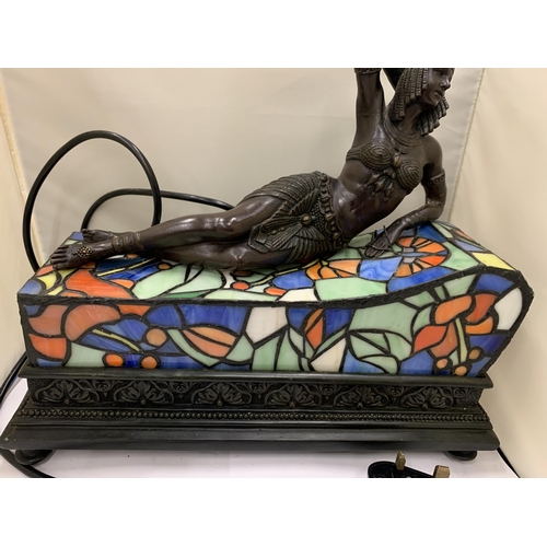 35 - AN ART NOVEAU STYLE BRONZE LADY ON A CHAISE LOUNGE TIFFANY LAMP SEEN WORKING BUT NO WARRANTY