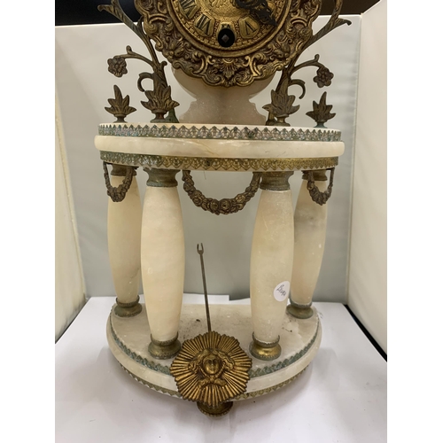 43 - A PORTICO CLOCK LOUIS XVI STYLE IN WHITE MARBLE WITH GILDED BRONZE. A HALF MOON SHAPED PORTICO WITH ... 