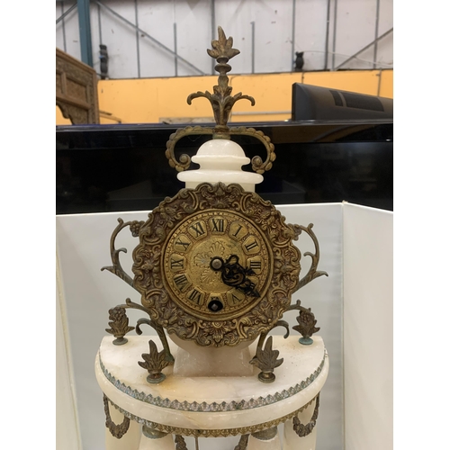 43 - A PORTICO CLOCK LOUIS XVI STYLE IN WHITE MARBLE WITH GILDED BRONZE. A HALF MOON SHAPED PORTICO WITH ... 