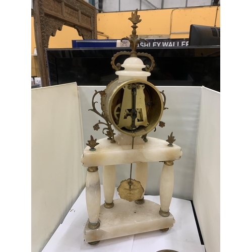 43 - A PORTICO CLOCK LOUIS XVI STYLE IN WHITE MARBLE WITH GILDED BRONZE. A HALF MOON SHAPED PORTICO WITH ... 