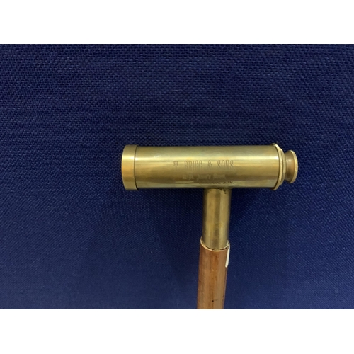 56 - A WALKING STICK WITH A BRASS TELESCOPE HANDLE