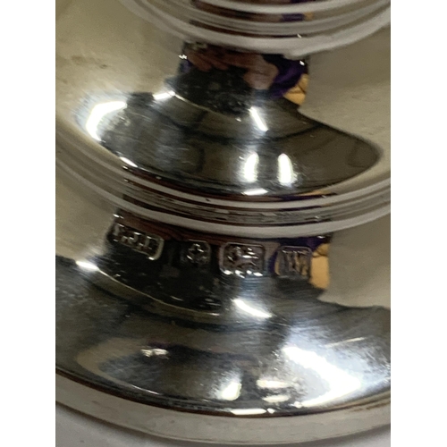 69 - A HALLMARKED BIRMINGHAM SILVER VASE ON A WEIGHTED BASE