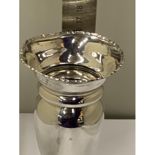 69 - A HALLMARKED BIRMINGHAM SILVER VASE ON A WEIGHTED BASE