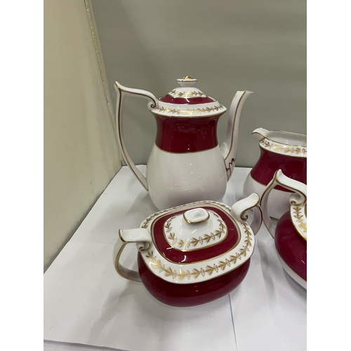 63 - A SPODE BONE CHINA COFFEE SET COMPRISING OF A COFFEE POT, JUG, LIDDED CREAM AND SUGAR