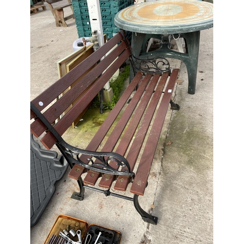 1853 - A WOODEN SLATTED GARDEN BENCH WITH CAST ENDS