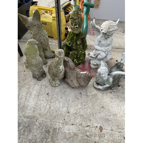 1872 - AN ASSORTMENT OF CONCRETE GARDEN FIGURES TO INCLUDE PIXIES AND A FOX ETC