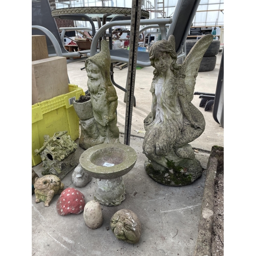 1877 - AN ASSORTMENT OF CONCRETE GARDEN FIGURES TO INCLUDE A FAIRY, GNOME AND BIRDBATH ETC