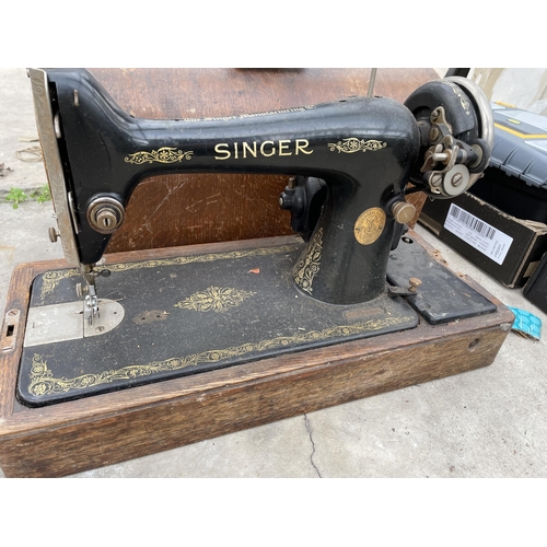 1888 - A VINTAGE SINGER SEWING MACHINE WITH CARRY CASE