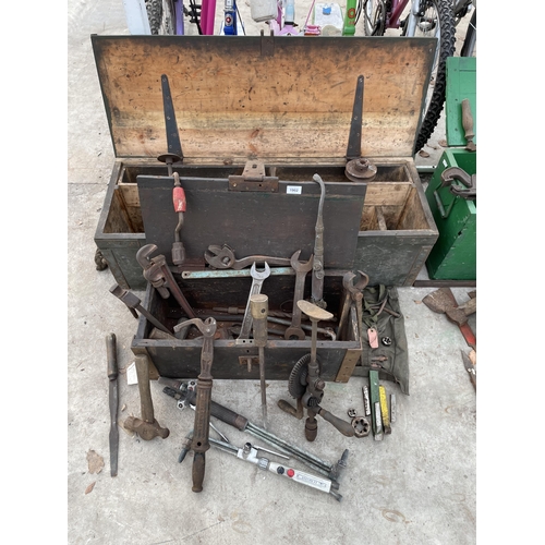 1902 - TWO WOODEN TOOL BOXES WITH AN ASSORTMENT OF TOOLS TO INCLUDE BRACE DRILLS, HAMMERS AND SPANNERS ETC