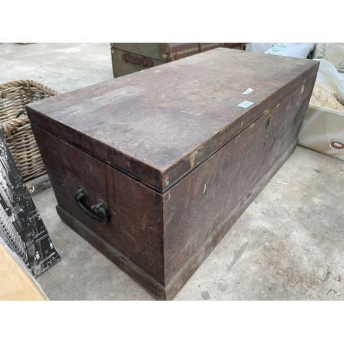 1919 - A LARGE WOODEN TOOL CHEST WITH AN ASSORTMENT OF TOOLS TO INCLUDE SPANNERS AND STILSENS ETC