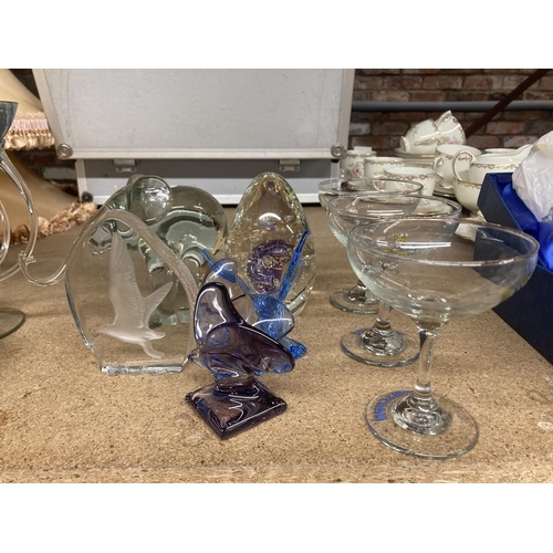 1075 - VARIOUS GLASS PAPERWEIGHTS AND THREE BABYCHAM GLASSES