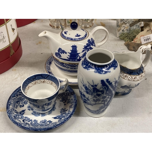 1089 - VARIOUS ITEMS OF BLUE AND WHITE WARE TO INCLUDE A TEAPOT, JUG, VASE ETC