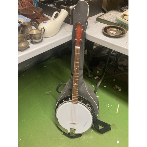 1102 - A MUSIMA BANJO WITH CASE