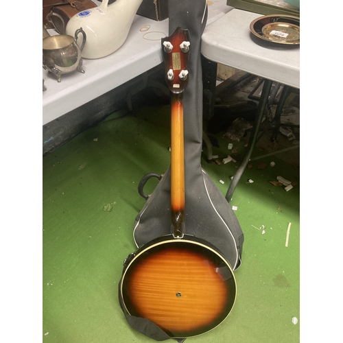 1102 - A MUSIMA BANJO WITH CASE