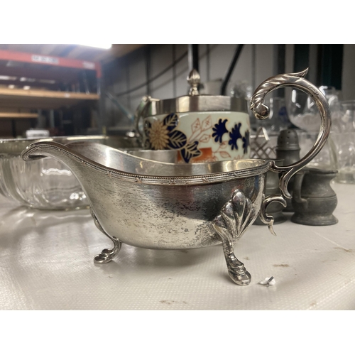 1111 - VARIOUS SILVER PLATED AND CERAMIC ITEMS TO INCLUDE A GRAVY BOAT, BISCUIT BARREL, BOWL, FOOTED DISH E... 