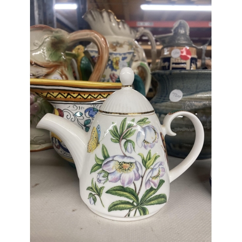 1113 - A COLLECTION OF VARIOUS CERAMIC JUGS AND TEAPOTS ETC