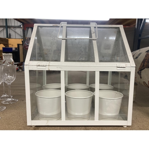 1117 - A MODERN WHITE FRAMED TERRARIUM WITH SIX POTS