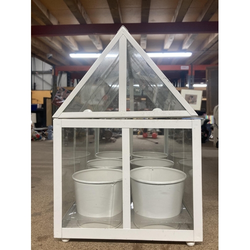 1117 - A MODERN WHITE FRAMED TERRARIUM WITH SIX POTS