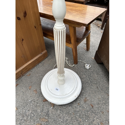 3206 - A PAINTED STANDARD LAMP WITH SHADE