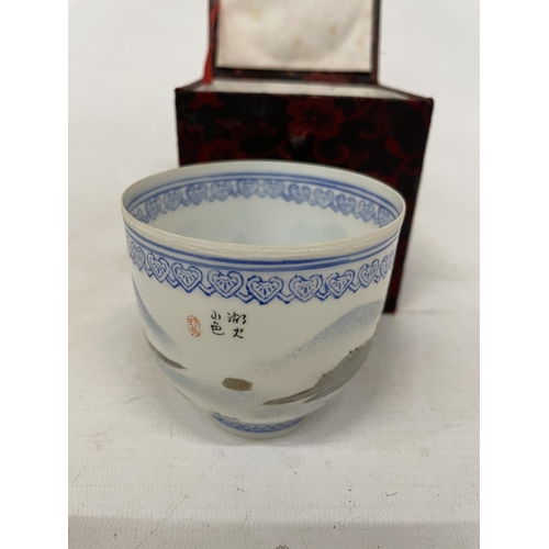 76 - A CHINESE EGGSHELL PAPER THIN PORCELAIN HAND PAINTED CUP WITH POLYCHROME LANDSCAPE DECORATION