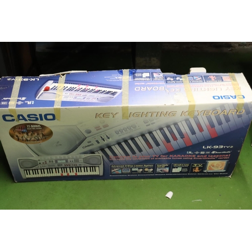 1268 - A CASIO, KEY LIGHTING, KEYBOARD, BOXED, VENDOR STATES IN WORKING ORDER, NO WARRANTY GIVEN