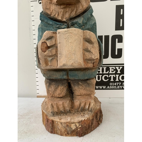 116 - A WOODEN PADDINGTON BEAR SCULPTURE CARVING ON LOG PEDESTAL, HEIGHT APPROX 80CM NO VAT