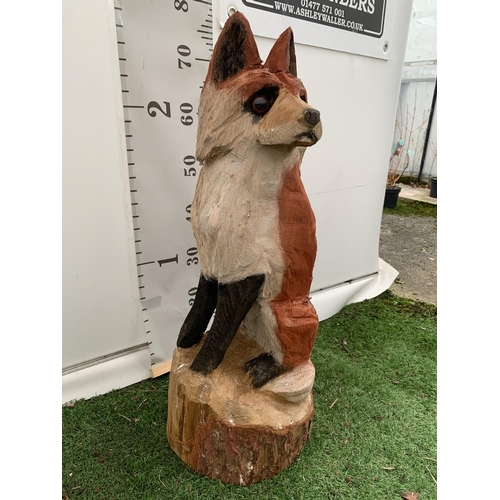 124 - A WOODEN SCULPTURE OF A FOX ON TREE TRUNK PEDESTAL APPROX 80CM IN HEIGHT NO VAT