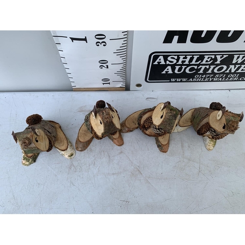 163 - FOUR SQUIRREL FIGURES MADE OUT OF LOGS, NO VAT TO BE SOLD FOR THE FOUR