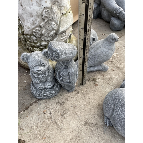 150 - FIVE VARIOUS CONCRETE GARDEN FIGURES TO INCLUDE A LEGO MAN AND A GUINEA PIG ETC NO VAT TO BE SOLD FO... 