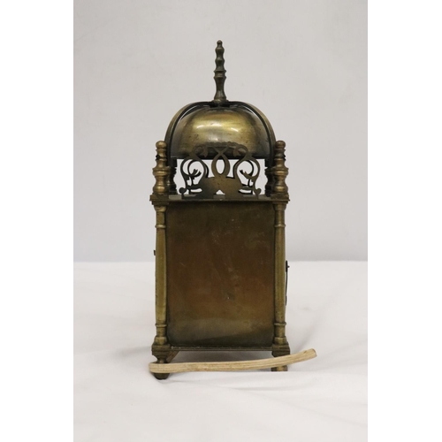 232 - A VINTAGE BRASS LANTERN CLOCK, HEIGHT 25CM