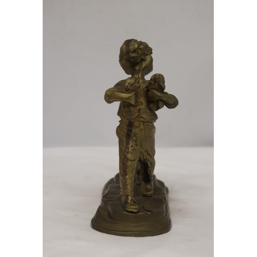 285 - A BRASS FIGURE OF A BOY WITH PUPPY DOGS, HEIGHT 20CM, WIDTH 20CM TOGETHER WITH A BRASS LADEL