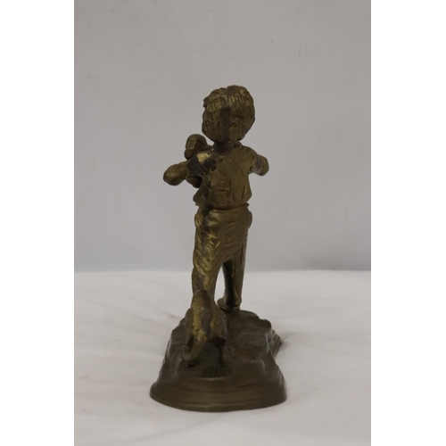 285 - A BRASS FIGURE OF A BOY WITH PUPPY DOGS, HEIGHT 20CM, WIDTH 20CM TOGETHER WITH A BRASS LADEL