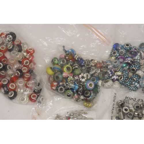 286 - A LARGE QUANTITY OF PANDORA STYLE BEADS, SOME MARKED 925