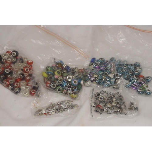 286 - A LARGE QUANTITY OF PANDORA STYLE BEADS, SOME MARKED 925