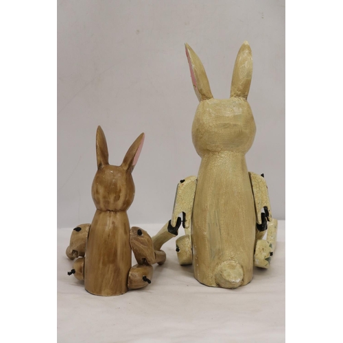 296 - TWO WOODEN SHELF RABBITS