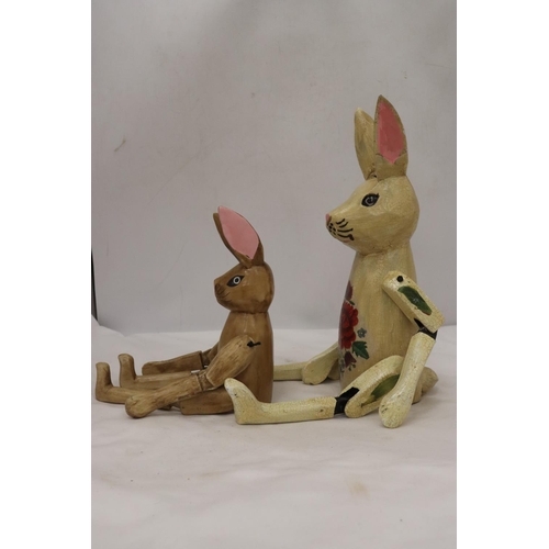 296 - TWO WOODEN SHELF RABBITS