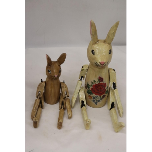 296 - TWO WOODEN SHELF RABBITS