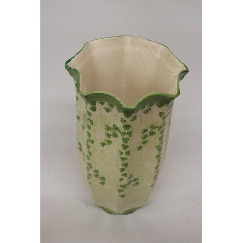 297 - A LARGE GREEN VASE WITH CLOVER DECORATION- 45 CM