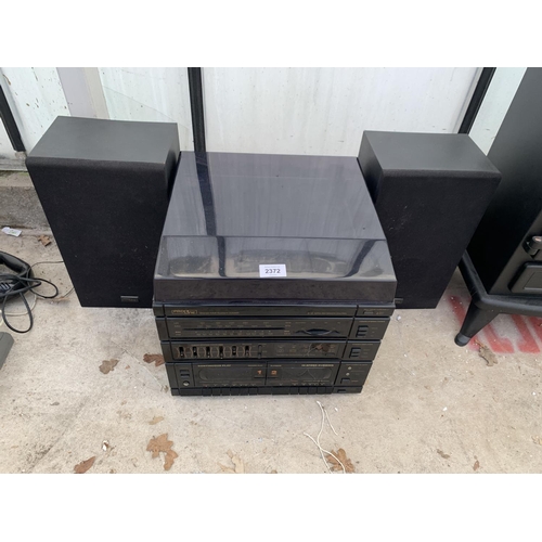 A PROLINE STEREO SYSTEM WITH RECORD DECKA ND A PAIR OF SPEAKERS