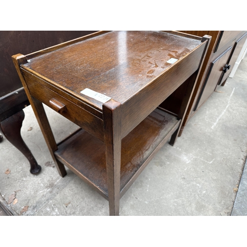 3280 - A MID CENTURY OAK TEA TROLLEY WITH SINGLE DRAWER