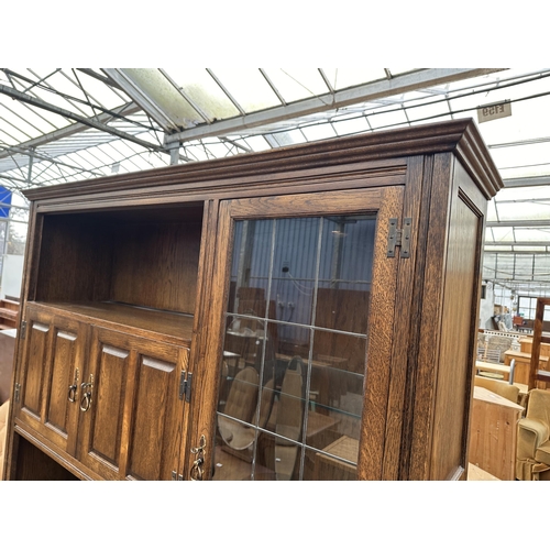 3281 - A WADE FURNITURE CABINET WITH  THREE UPPER DOORS AND THREE DOORS AND THREE DRAWERS