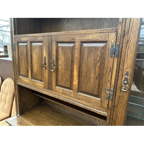 3281 - A WADE FURNITURE CABINET WITH  THREE UPPER DOORS AND THREE DOORS AND THREE DRAWERS