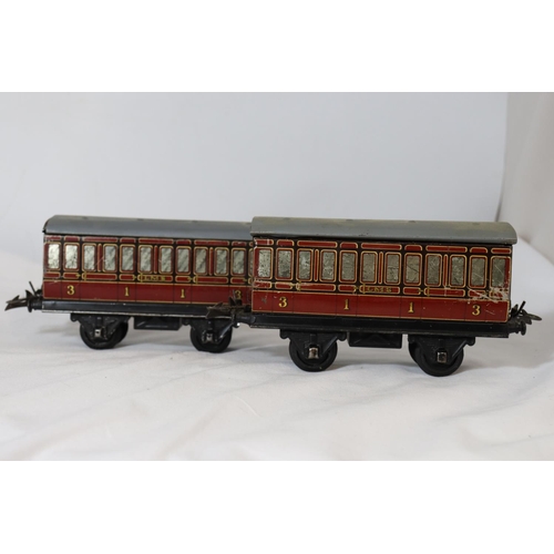 322 - TWO HORNBY .30 GAUGE METAL RAILWAY CARRIAGES LENGTH 17 CM