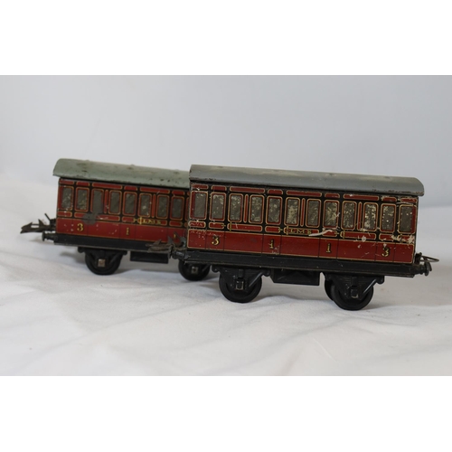 323 - TWO HORNBY .30 GAUGE METAL RAILWAY CARRIAGES LENGTH 17 CM