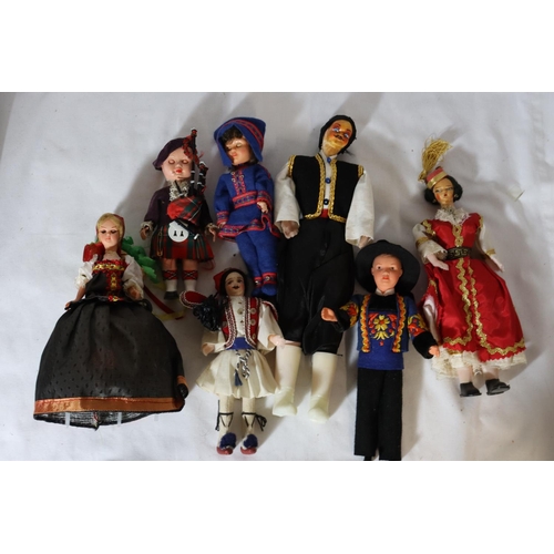 350 - A LARGE COLLECTION OF DOLLS FROM AROUND THE WORLD